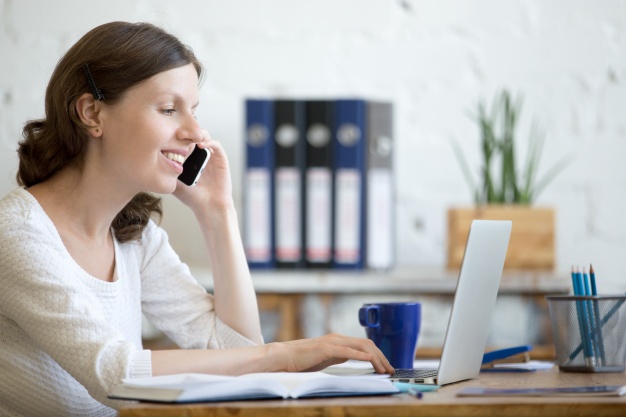 woman talking to her phone cold calling training course success institute australia